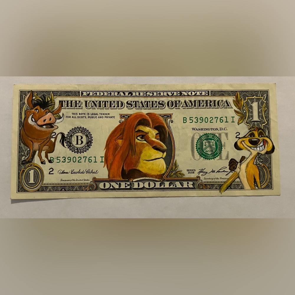 Lion King tribute artwork on a dollar bill